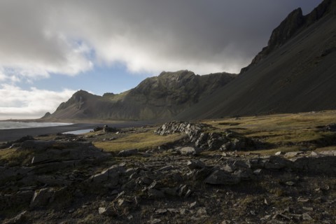 Mountains over rural field