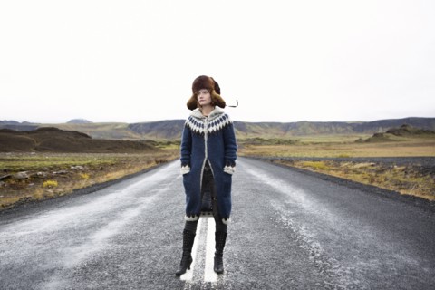 Caucasian woman standing in middle of road