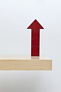 Red arrow pointing up