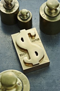 Gold ingot with dollar sign symbol
