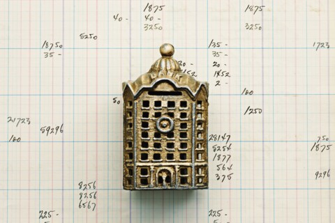 Small building replica on graph paper