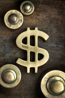 Close up of gold dollar sign