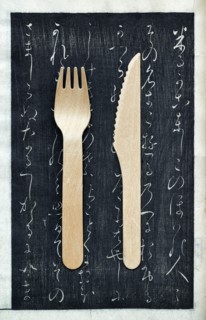 Wooden fork and knife on chalkboard
