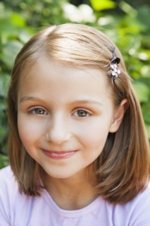 Close up of smiling girl outdoors