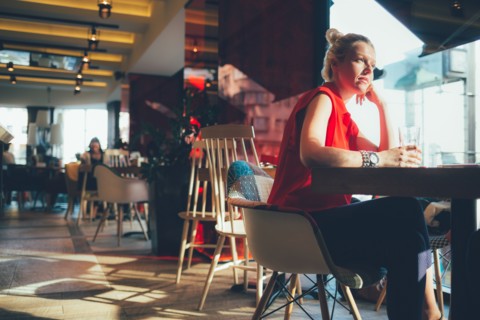 Woman relaxing in cafe