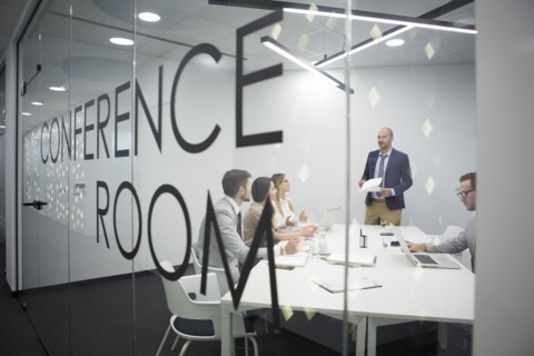 Caucasian business people talking in office meeting