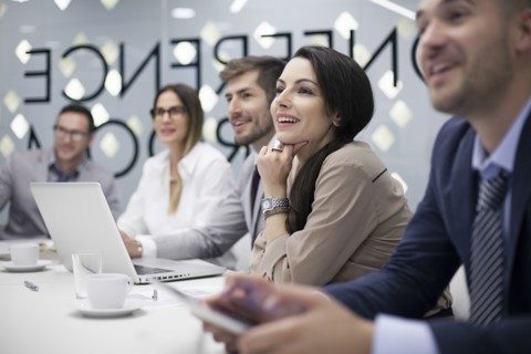 Caucasian business people listening in office meeting