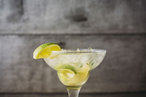 Close up of mojito cocktail drink with lime