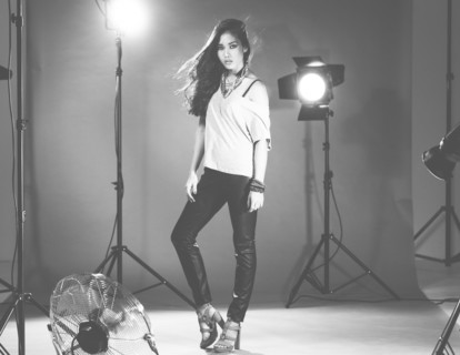 Glamorous woman posing in photo shoot
