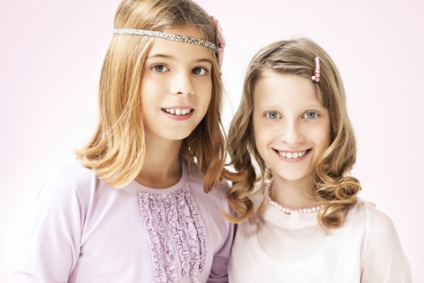 Close up of smiling girls standing