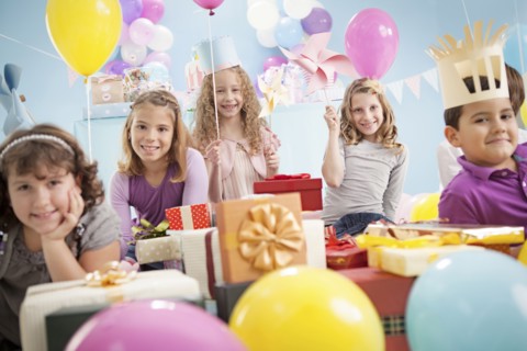 Children smiling at birthday party