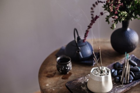 Incense burning on table