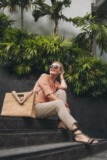 Caucasian woman sitting on stairs