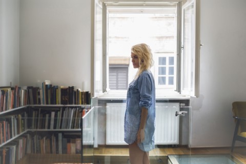 Woman standing in living room