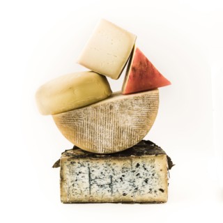Pile of variety of cheeses