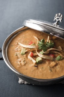 Tortilla soup in silver pot