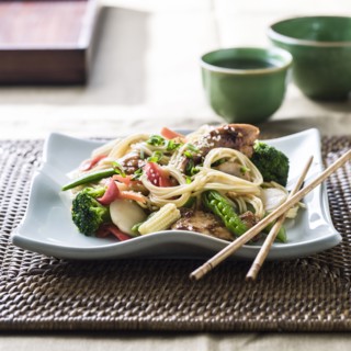 Stir fry on plate with chopsticks