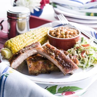 Pork rib dinner with corn and beans