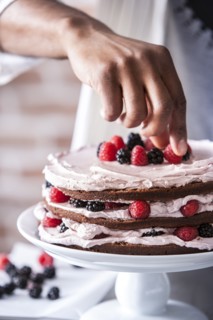 Chocolate cake with berries and cream filling