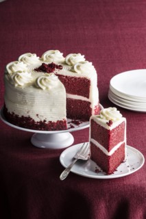 Slice of red velvet cake on plate