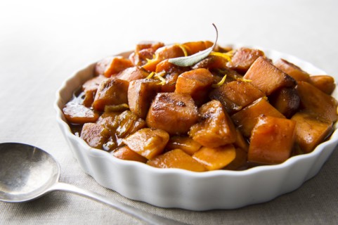 Plate of candied yams and spoon