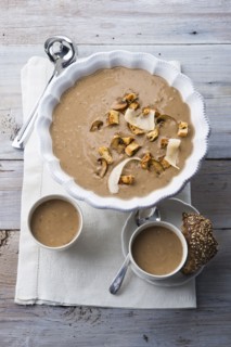 Mushroom soup on wooden table