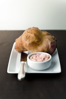 Popover with strawberry butter on plate