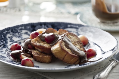 French toast with syrup and cherries