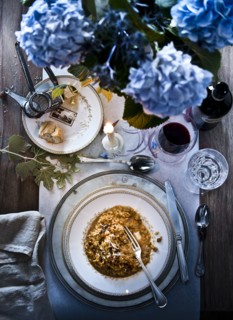 Mushroom risotto meal with wine