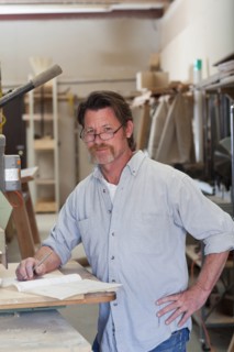 Caucasian carpenter in workshop