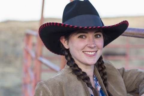Caucasian girl smiling on farm