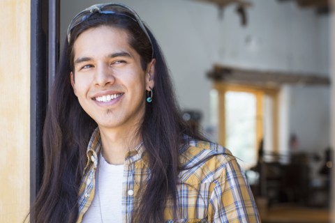 Mixed race man smiling