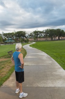 Hispanic man standing in park