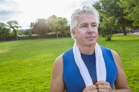 Hispanic man standing in park