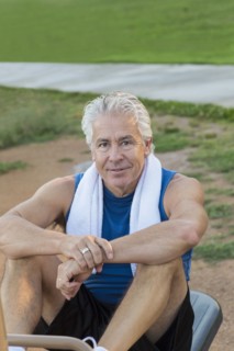 Hispanic man exercising in park