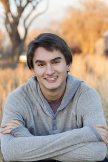 Mixed race teenage boy smiling