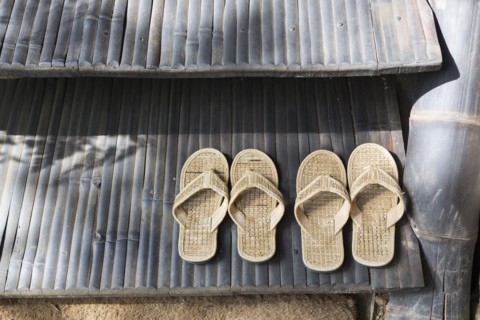 Straw flipflops on step