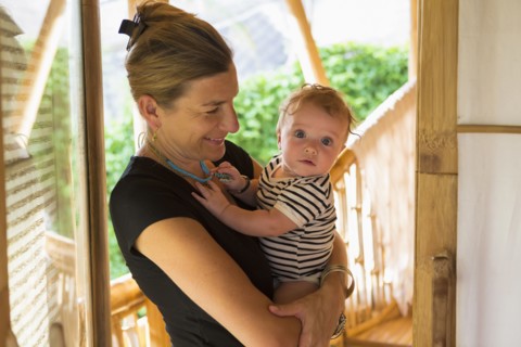 Caucasian mother holding baby