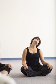 Student stretching in acting class