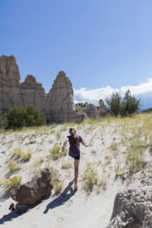 Caucasian girl exploring rock formations