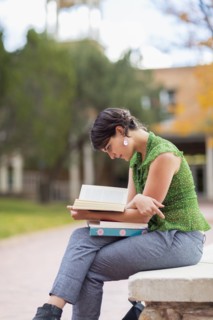 Mixed race student studying on campus