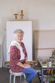 Artist smiling in studio