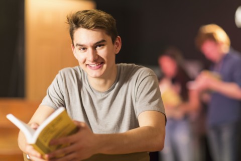 Portrait of smiling Mixed Race teenage boy