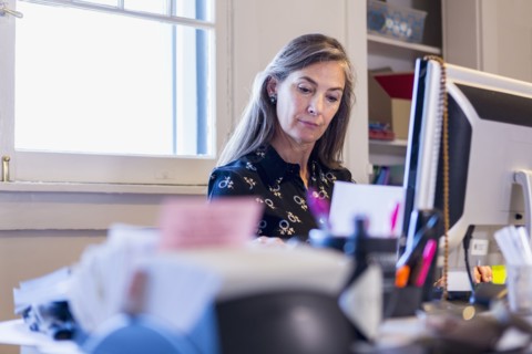 Caucasian businesswoman using computer