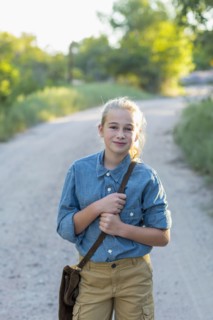 Portrait of confidence Caucasian girl hiking