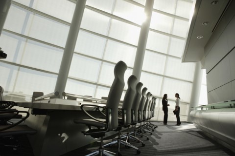 Businesswomen talking in conference room