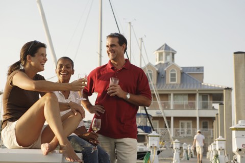 Friends having drinks at marina