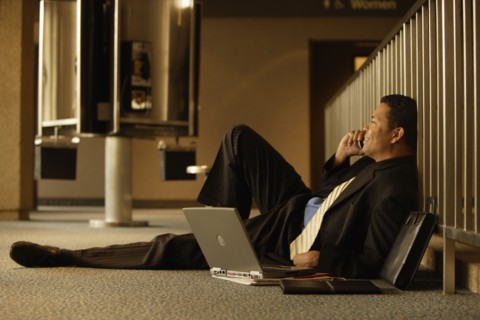 Hispanic businessman talking on cell phone
