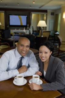 African businesspeople drinking coffee