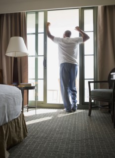 African man wearing pajamas in morning
